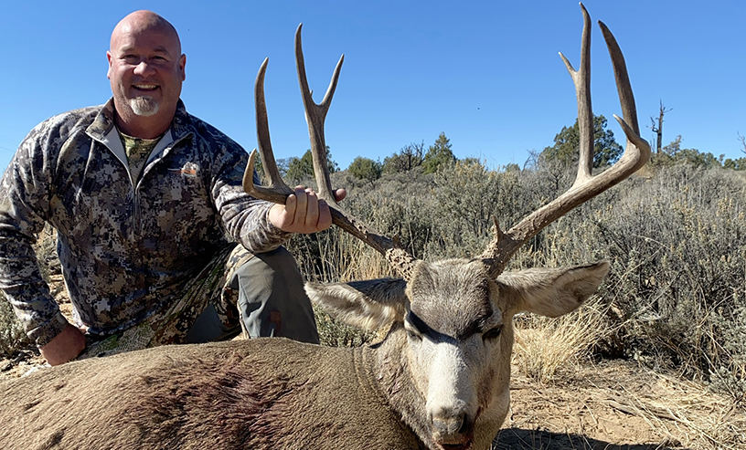 NS Hunter With Mule Deer